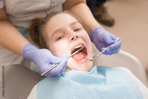 Young girl at dentist.  dental treatment   