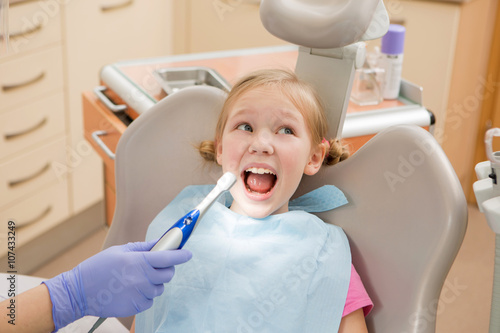Young girl at dentist., dental treatment 