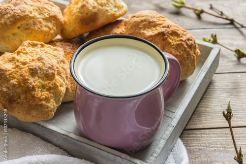 Fresh rolls and a Cup of milk  and lavender