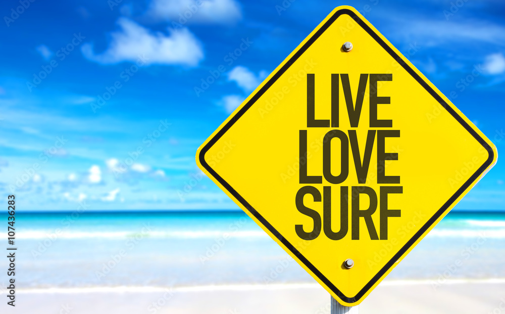 Live Love Surf sign with beach background