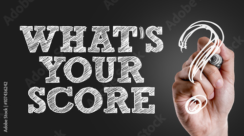 Hand writing the text: Whats Your Score?
