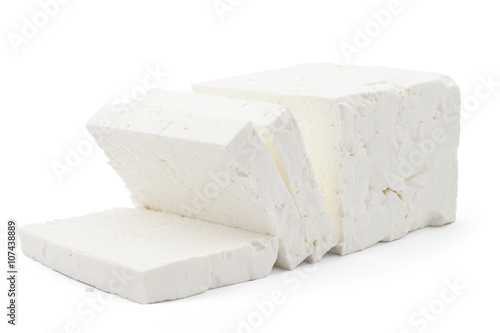 Sliced fresh white cheese from cow's milk on white background