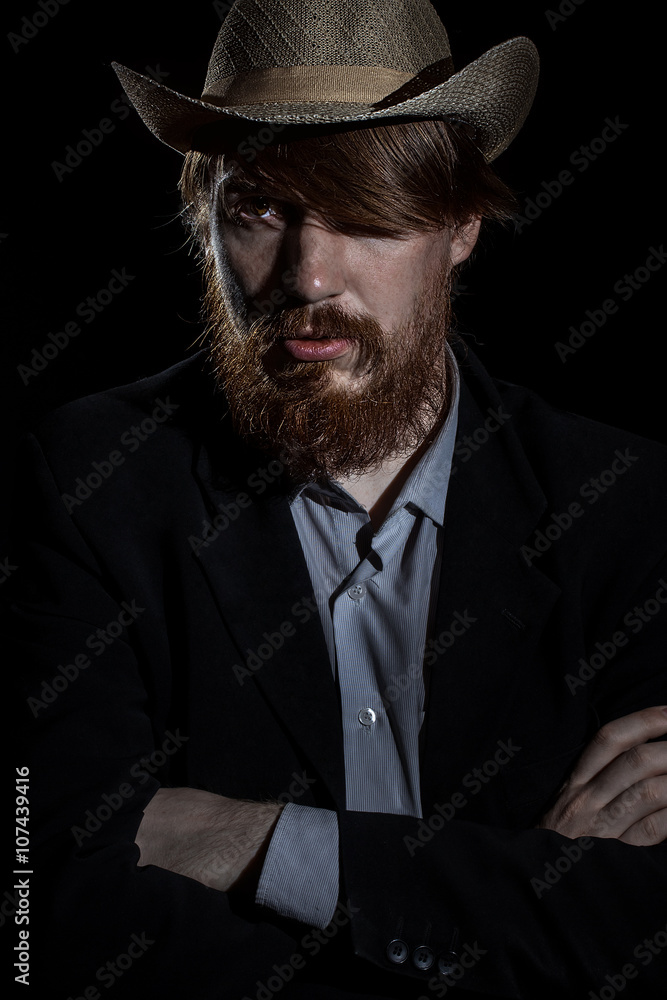 The bearded man on a dark background The bearded man on a dark background