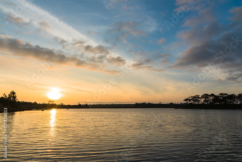 Sunrise over the lake. © chanwitohm