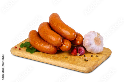 Sausage on wooden background