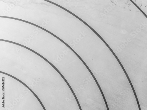 Abstract black curves on gray background