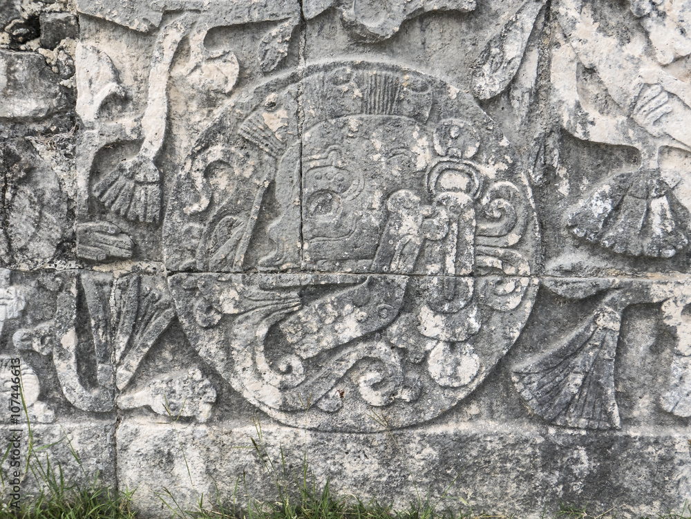 skulls sculpture detail in chichen itza mexico