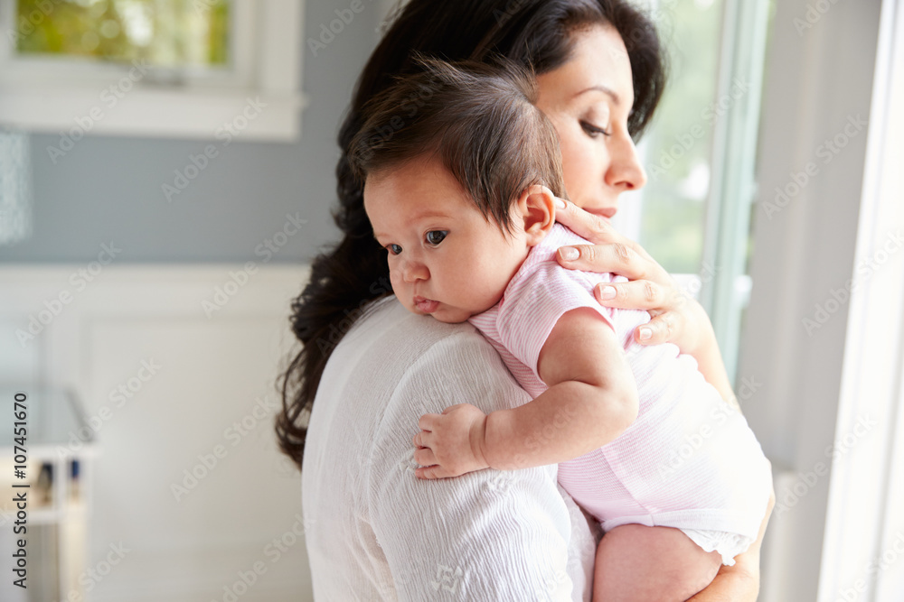Loving Mother Holding Baby Daughter At Home Loving Mother Holding Baby Daughter At Home