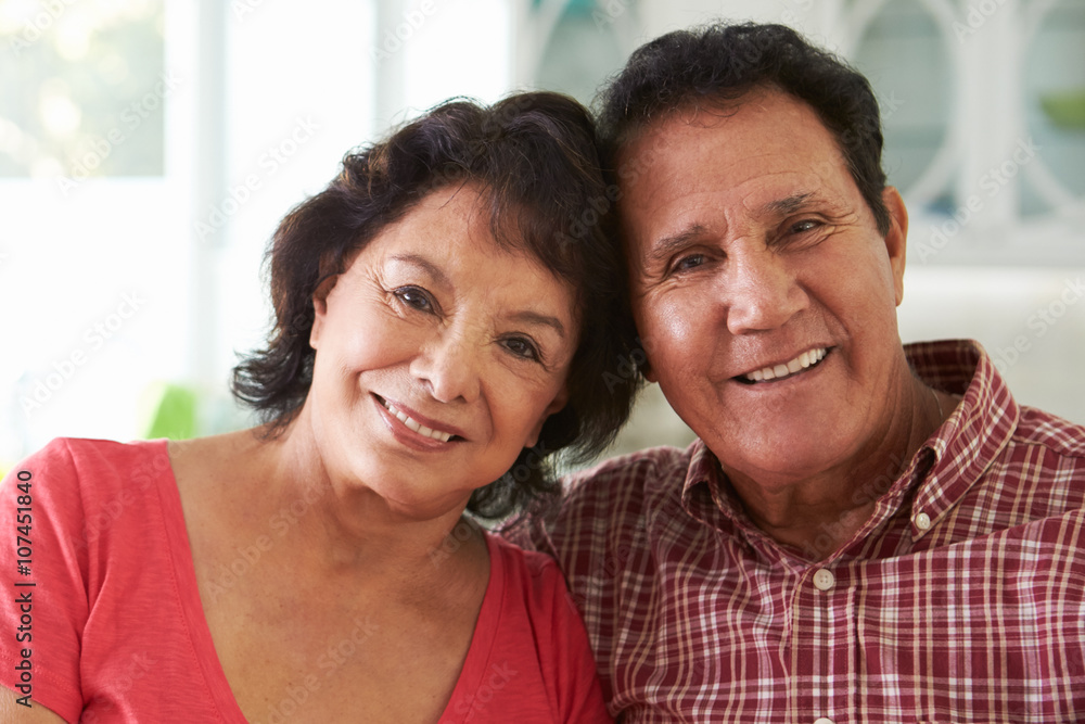 Head And Shoulders Shot Of Senior Hispanic Couple At Home Head And Shoulders Shot Of Senior Hispanic Couple At Home