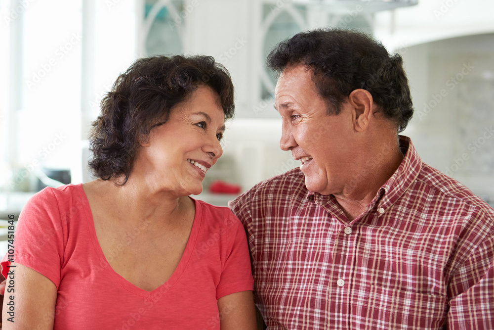 Head And Shoulders Shot Of Senior Hispanic Couple At Home Head And Shoulders Shot Of Senior Hispanic Couple At Home