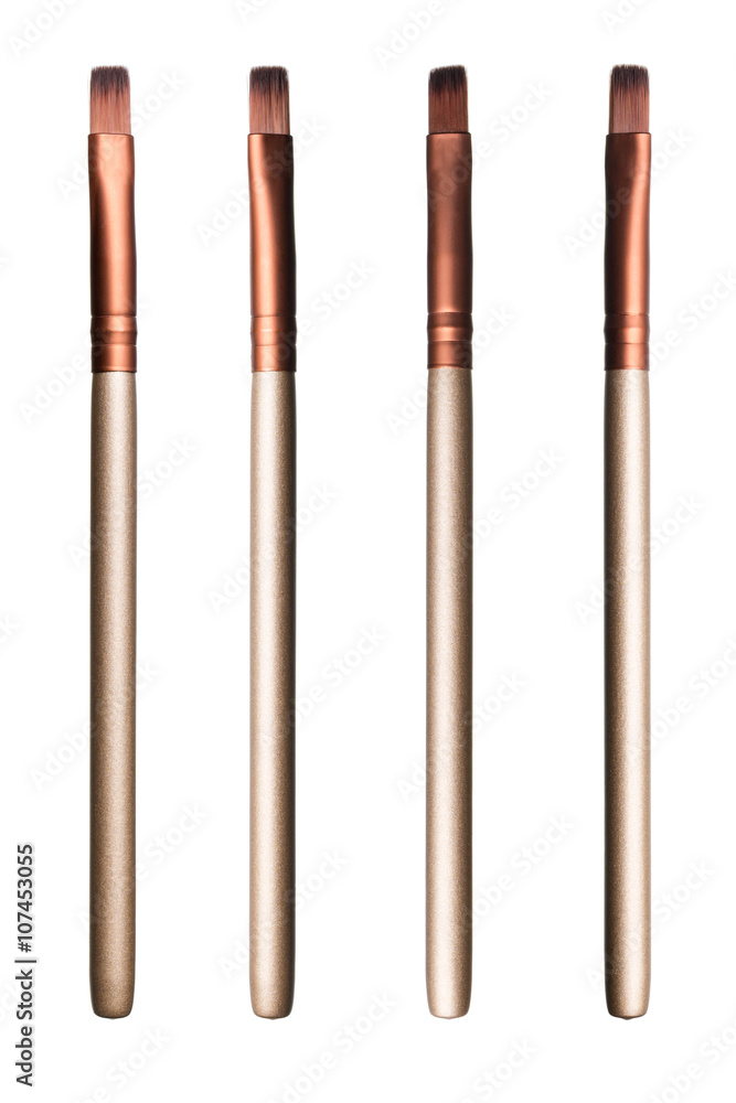 Set of brown soft cosmetic brushes in different light conditions Set of brown soft cosmetic brushes in different light conditions