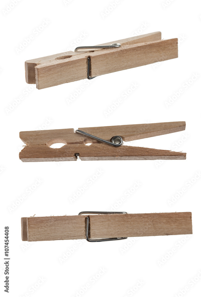 Wooden clothes pin isolated on white background. Set at differen Wooden clothes pin isolated on white background. Set at differen