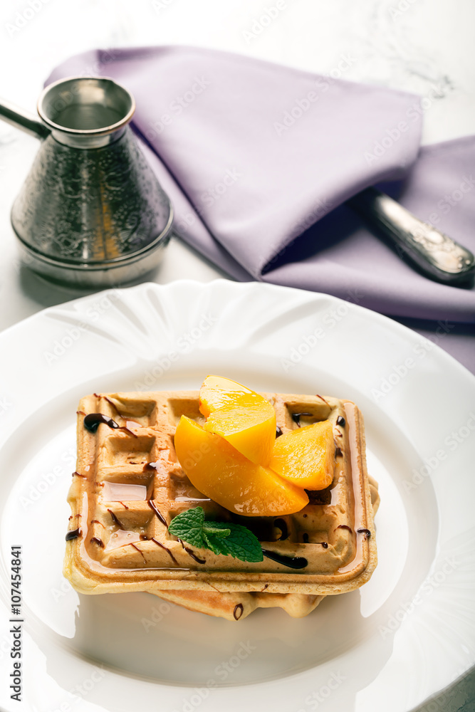 Viennese waffles with peaches and chocolate Viennese waffles with peaches and chocolate