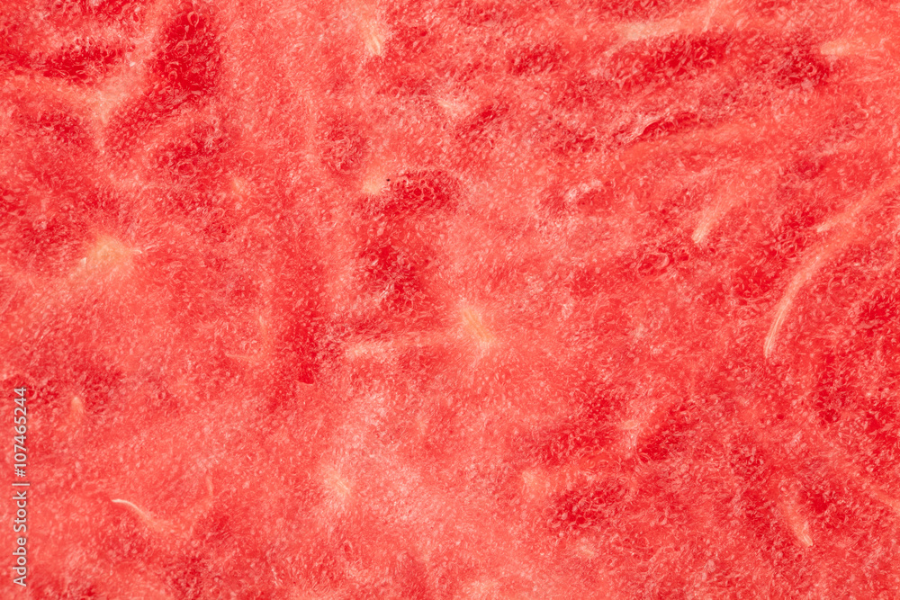 Background texture of a fresh juicy pink watermelon for a refreshing summer snack