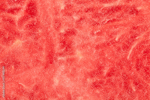Background texture of a fresh juicy pink watermelon for a refreshing summer snack