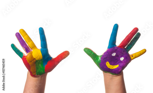 Two colorful hands with smile painted with different colors of child as logo 
