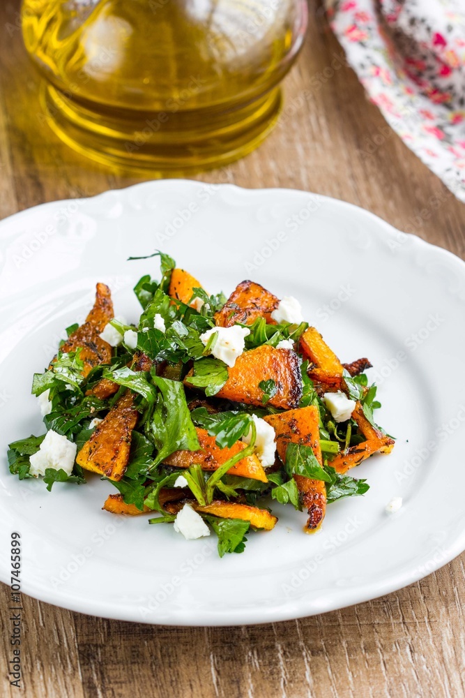 Warm salad with roasted pumpkin, parsley, spinach, feta, healthy Warm salad with roasted pumpkin, parsley, spinach, feta, healthy