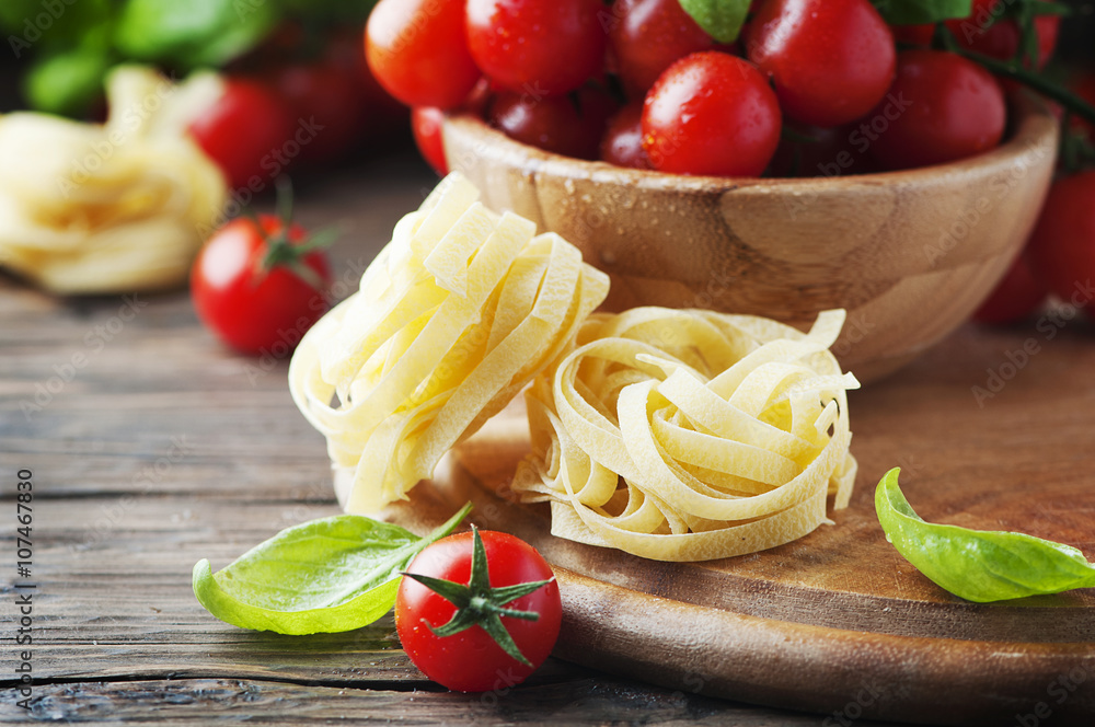 Concept of italian food with pasta and tomato Concept of italian food with pasta and tomato
