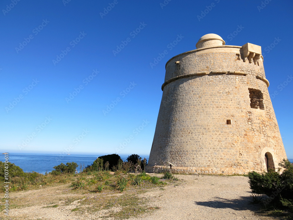 Medieval guard tower in Playa den Bossa, Ibiza, Balearic Island Stock Photo  | Adobe Stock