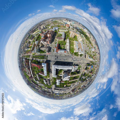 Wallpaper Mural Aerial city view with crossroads and roads, houses, buildings, parks and parking lots, bridges. Copter shot. Little planet mode. Full sphere. Torontodigital.ca