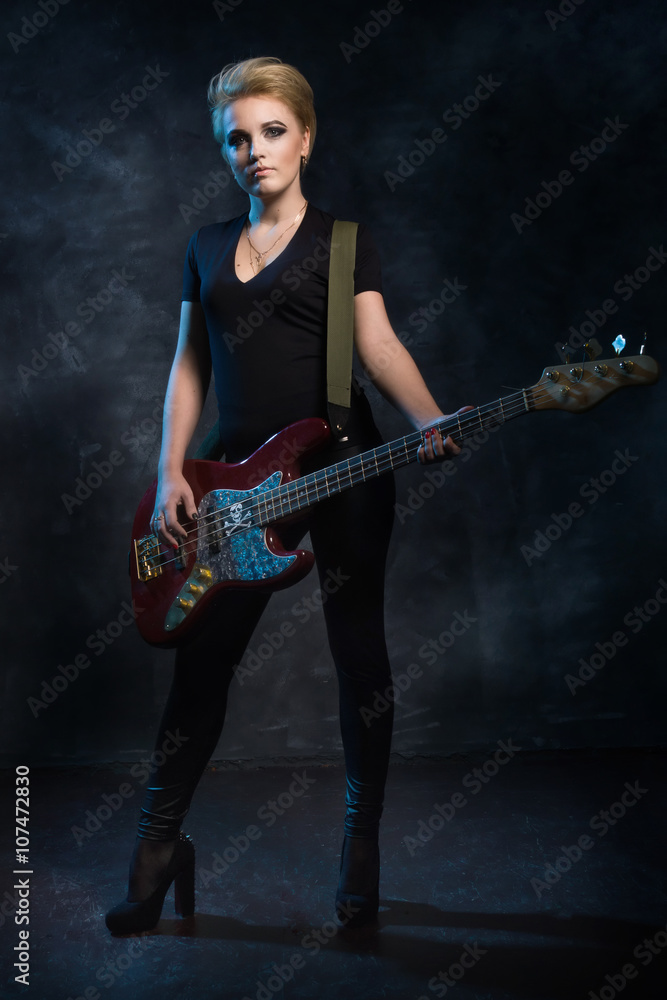 Fototapeta premium Rock star playing bass guitar