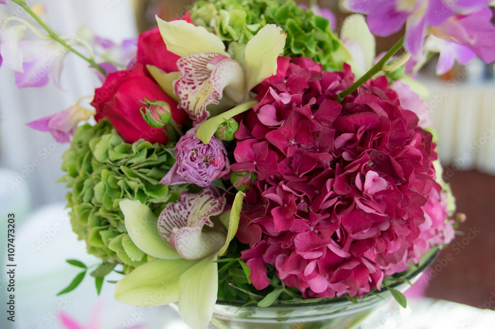 Colorful bouquet with hydrangea, roses and orchid, wedding decoration