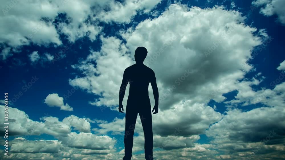 4 in 1!The man stand against the background of cloud flow