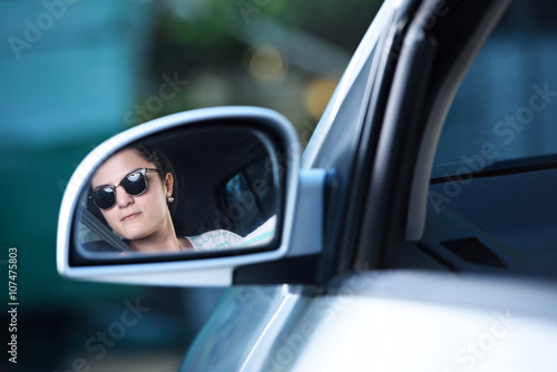 woman driver in mirrow
