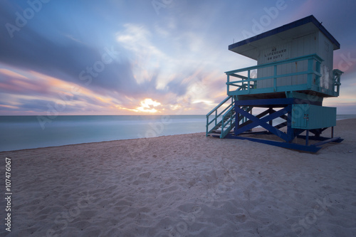 Sunrise in Miami Beach with a lifeguard post  © pop_gino