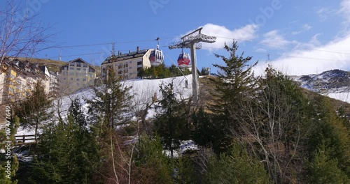 day time sun light ski lift cabins 4k sierra nevada spain
