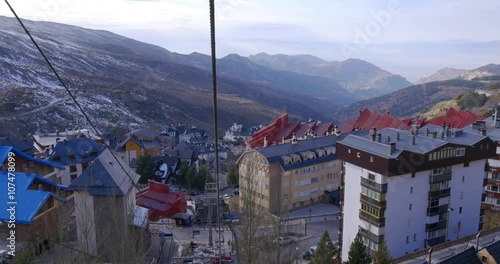 day light sierra nevada ski lift riding down panoramic view 4k spain
