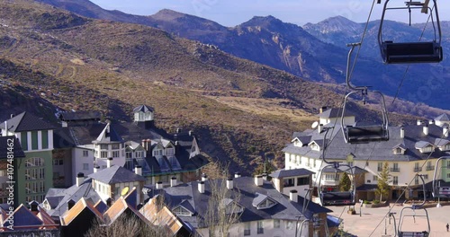 sierra nevada day light spain ski resort town ski lift 4k 
