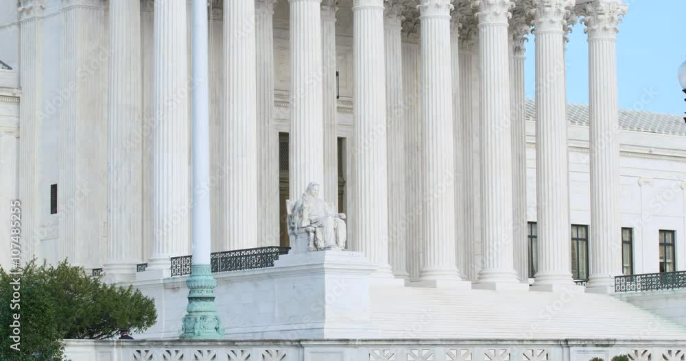 The US Supreme Court tilt up from steps to flag 4K The US Supreme Court tilt up from steps to flag 4K