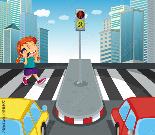 Girl talking on the phone and crossing street