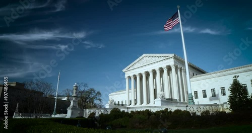 The US Supreme Court wide 4K blue sky high clouds nice flags.mp4