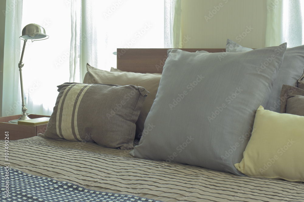 Linen pillows in difference size on bed in modern japanese style Linen pillows in difference size on bed in modern japanese style