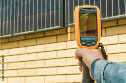 Thermal imaging of Photovoltaic Solar Panels on the Wall With Th