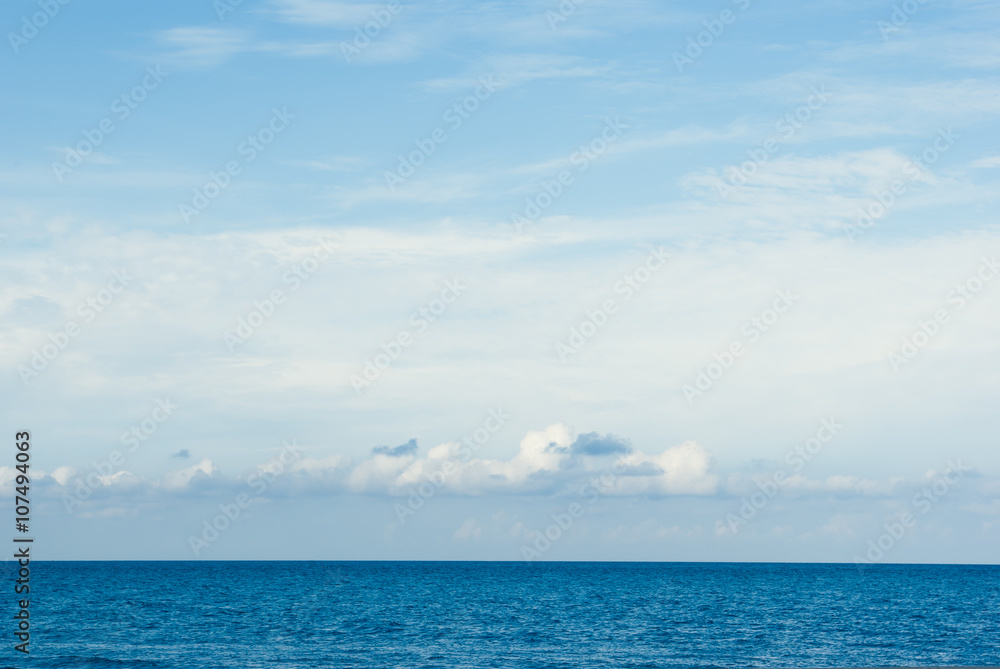 Blue clear sky and blue sea landscape.