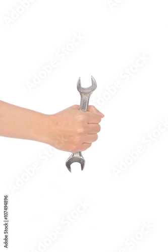 Wrench in hand on white background, selective focus