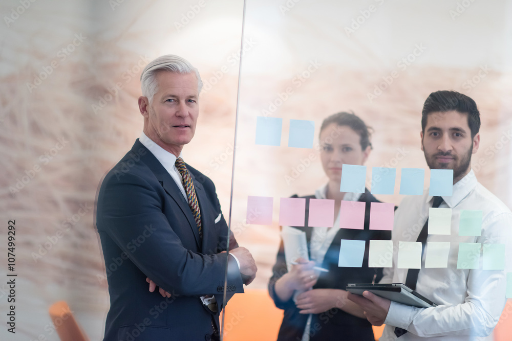 young creative business people with senior ceo young creative business people with senior ceo