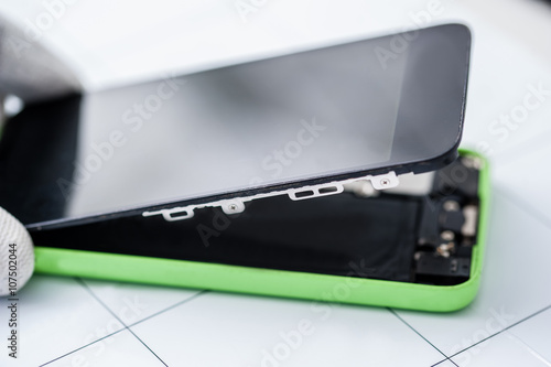Close-up photosof mobile phone in a repair shop