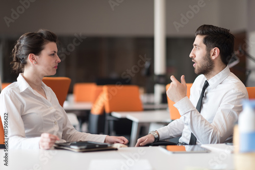 business couple working together on project photo