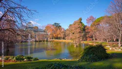 sunny day pond view on crystal palace 4k time lapse  spain madrid
