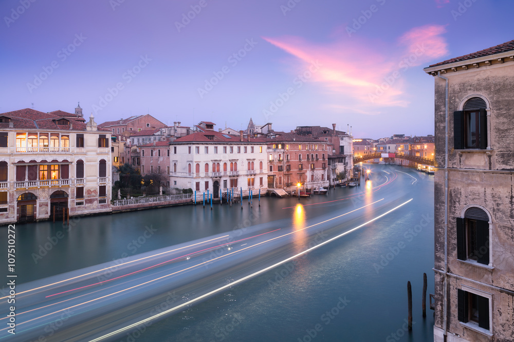 Boat light trails on Grand Canal in Venice at dusk