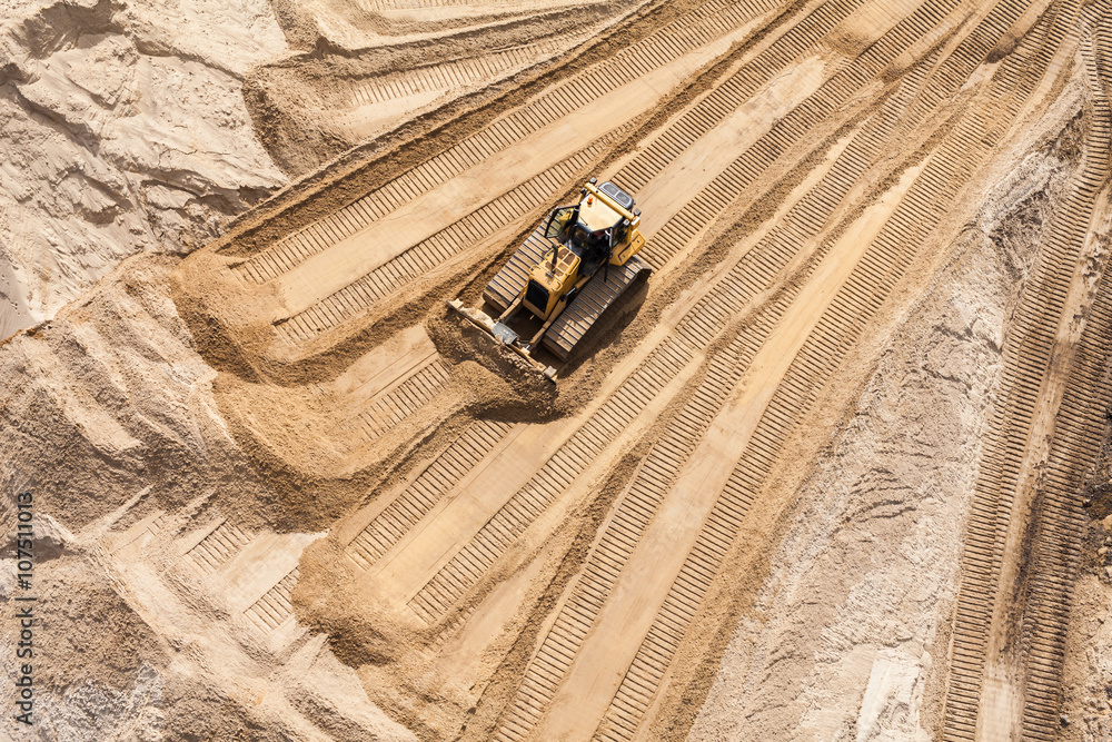 Aerial view of the working earth mover Aerial view of the working earth mover