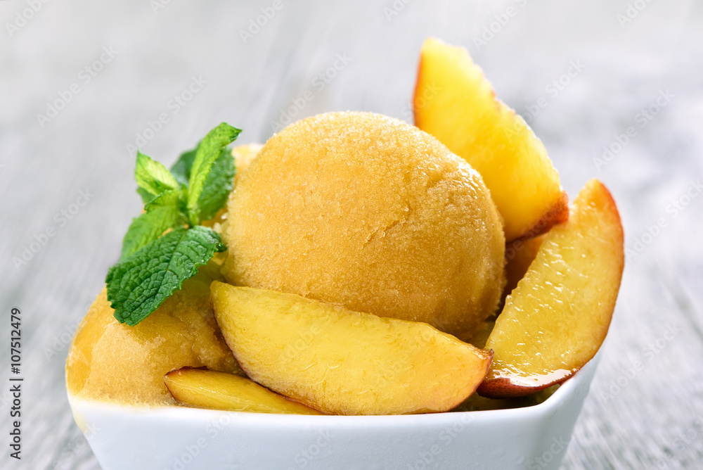 Peach ice cream with slices Peach ice cream with slices