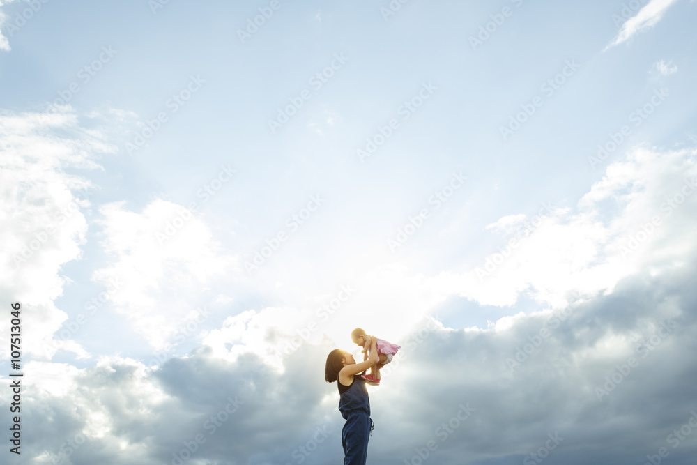 Happy young family spending time outdoor on a summer day - Vibra Happy young family spending time outdoor on a summer day - Vibra