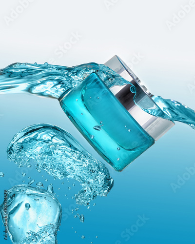 The blue  jar of moisturizing gel with blue water splash around the jar on the gradient blue background