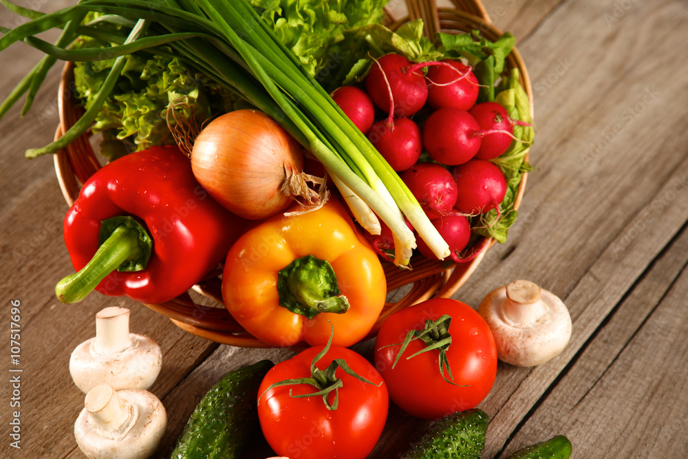 Vegetables . Fresh Bio Vegetable in a Basket. Over Nature Background Vegetables . Fresh Bio Vegetable in a Basket. Over Nature Background