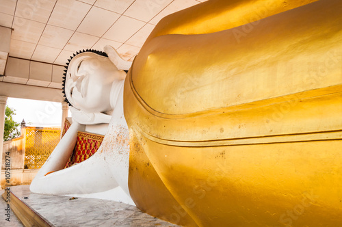 reclining Buddha statue in Temple photo